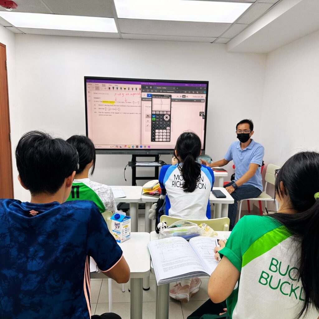 Future Academy teacher guiding IP Math problem-solving in small group class (max 1:6) in Singapore