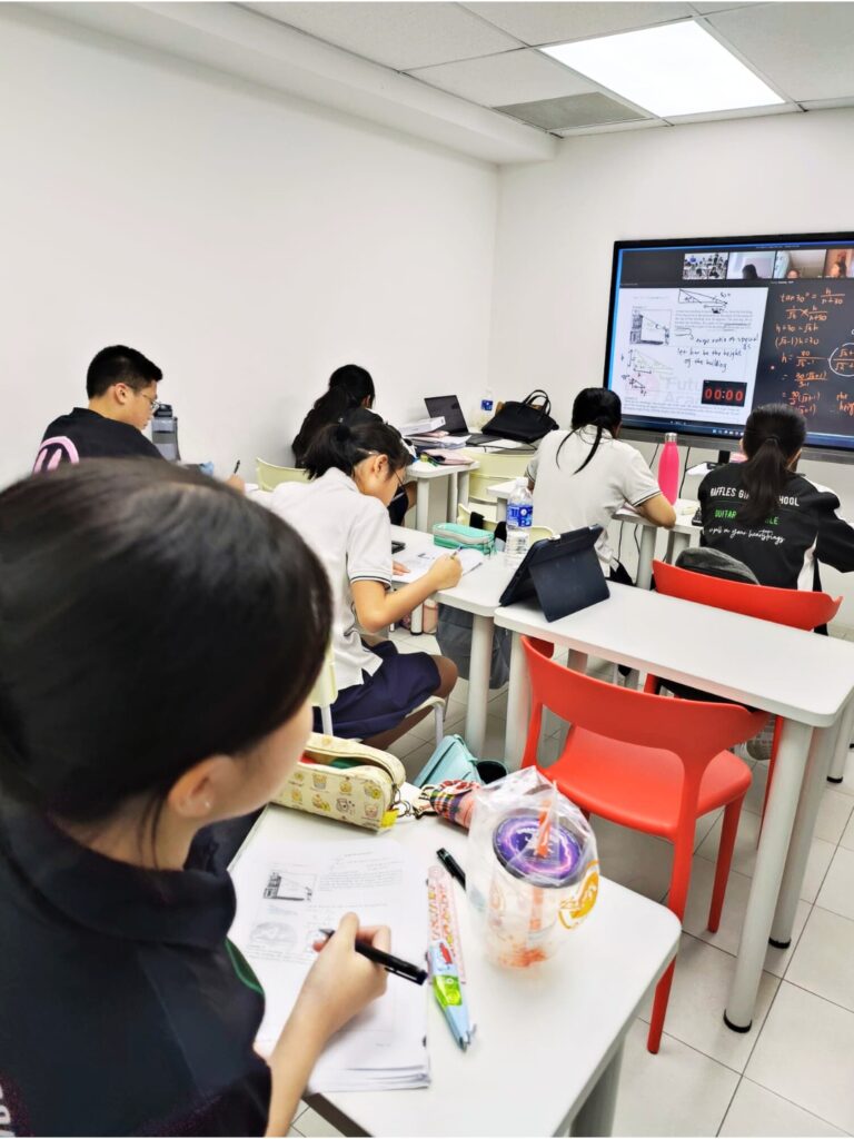 IP English Language Arts tuition class at Future Academy with small group discussion